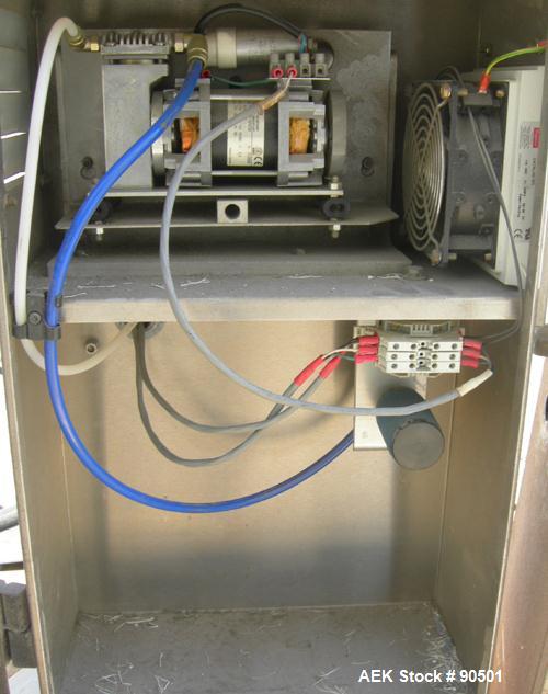 USED: Domino ink jet coder, model A300. Designed for 4 line printing in a harsh environment. Stainless steel cabinet with touch screen. Mounted on casters.