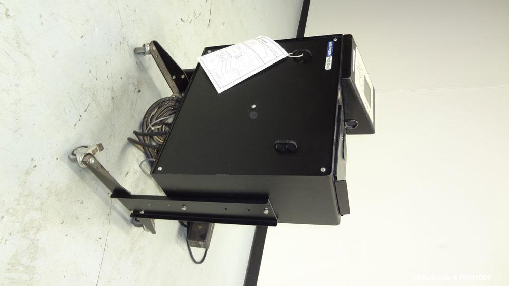 Used Markem 5000 Series Touch Dry Ink Jet Printer, Model 5200. Print area 65mm x 1200mm per printhead (2.56" x 47.25"). Print speed 55m/minute (180ft/min). Most industry standard bar codes including ...