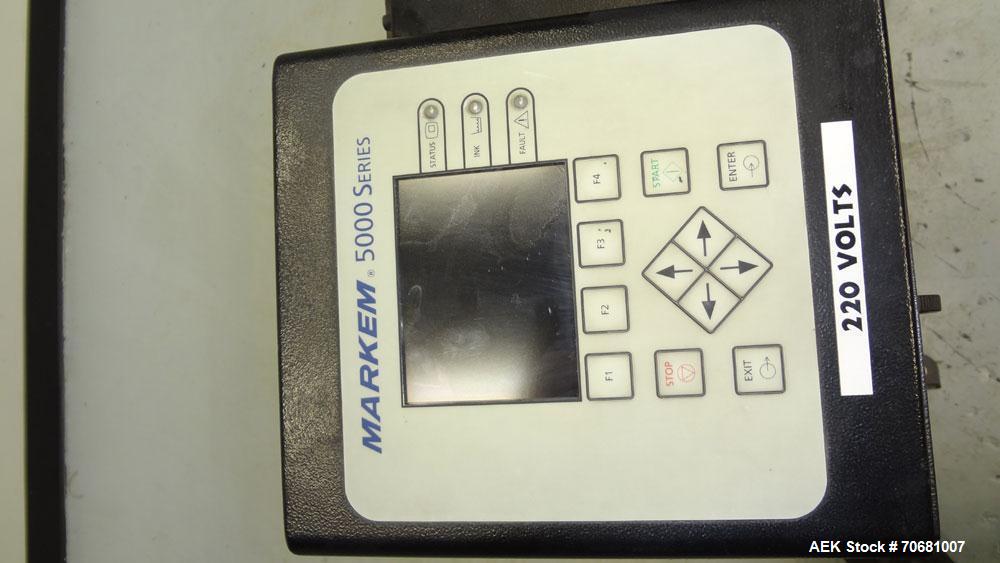 Used Markem 5000 Series Touch Dry Ink Jet Printer, Model 5200. Print area 65mm x 1200mm per printhead (2.56" x 47.25"). Print speed 55m/minute (180ft/min). Most industry standard bar codes including ...