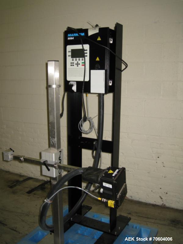 Used Markem Model 9064 Ink Jet Coder. Small character coder with print height up to 1" or 25.4 mm.  Message length up to 14" or 356 mm. Stores up to 50 messages.  Prints up to 8 lines of text. Printh...