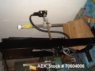 Used Markem Model 9064 Ink Jet Coder. Small character coder with print height up to 1" or 25.4 mm.  Message length up to 14" or 356 mm. Stores up to 50 messages.  Prints up to 8 lines of text. Printh...