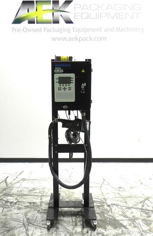 Used Markem Model 9064 Ink Jet Coder. Small character coder with print height up to 1" or 25.4 mm. Message length up to 14" or 356 mm. Stores up to 50 messages. Prints up to 8 lines of text. Printhea...