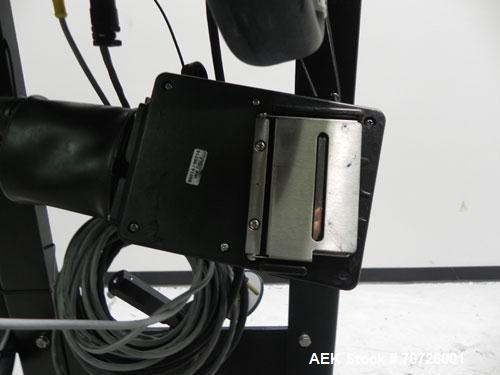 Used Markem Model 9064 Ink Jet Coder. Small character coder with print height up to 1" or 25.4 mm. Message length up to 14" or 356 mm. Stores up to 50 messages. Prints up to 8 lines of text. Printhea...
