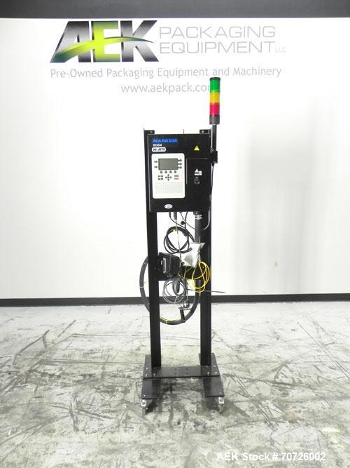 Used Markem Model 9064 Ink Jet Coder. small character coder with print height up to 1" or 25.4 mm. Message length up to 14" or 356 mm. Stores up to 50 messages. Prints up to 8 lines of text. Printhea...