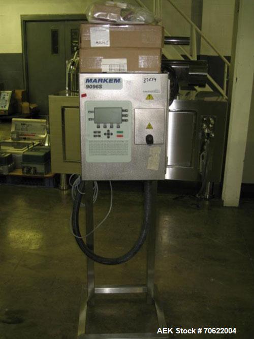 Used Markem Coder, Model 9096S. Print head on stainless steel stand with controls, 115/230 volt, serial #050531.