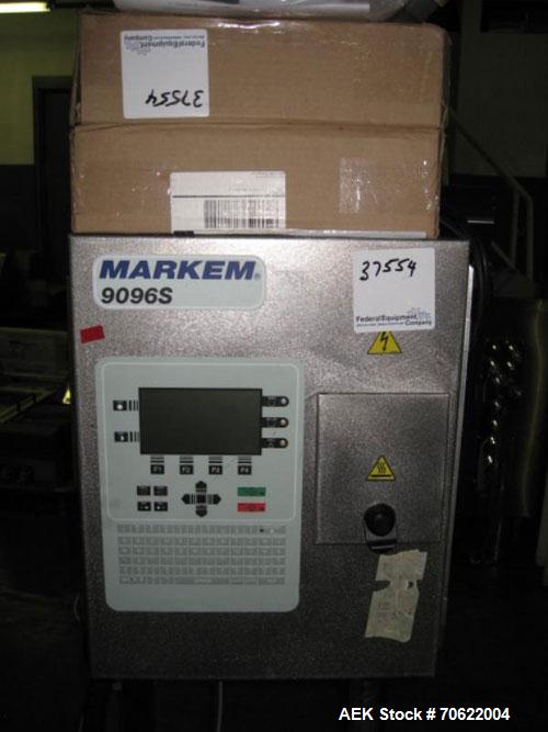 Used Markem Coder, Model 9096S. Print head on stainless steel stand with controls, 115/230 volt, serial #050531.