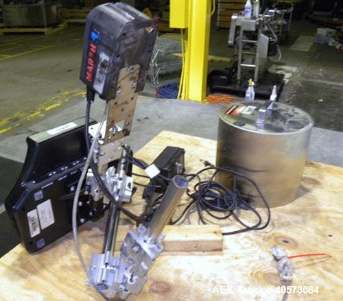 Used Marsh Ink Jet Coder, Model Patrion. Marsh key board part #27171, head #27132. Includes an AC adapter and an air drive system.