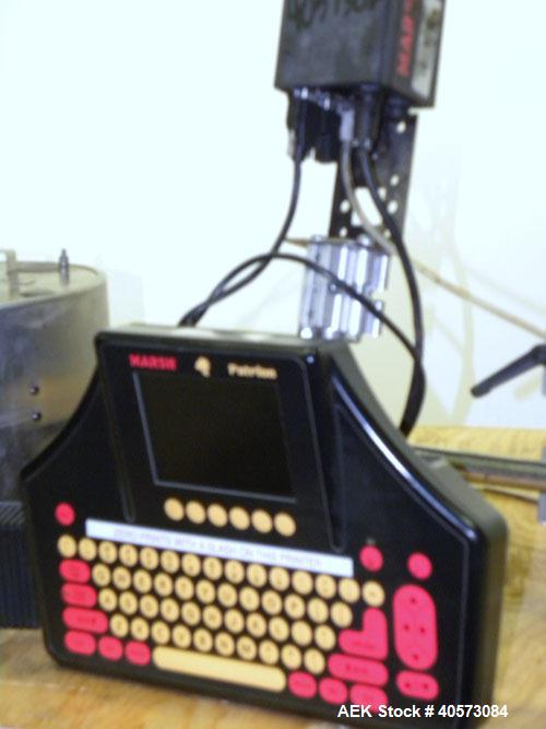 Used Marsh Ink Jet Coder, Model Patrion. Marsh key board part #27171, head #27132. Includes an AC adapter and an air drive system.