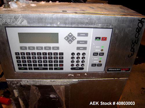 Used Videojet Ink Jet Marking Machine, Model Excel/273SE. 1/50/60/100-240 volt, 2 scfm, 100 psi. Includes 2 printing heads and a pedestal stand.