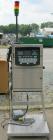 Used Domino A200 Small Character Ink Jet Coder, Model A200. Can print up to four lines of type with a variety of print formats including Logos, bar codes, automatic serial numbering/batch coding. Hig...