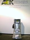 Unused- Domino A200 Small Character Ink Jet Coder, Model A200. Can print up to four lines of type with a variety of print formats including logos, bar codes, automatic serial numbering/batch coding. ...