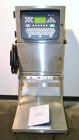 Unused- Domino A200 Small Character Ink Jet Coder, Model A200. Can print up to four lines of type with a variety of print formats including logos, bar codes, automatic serial numbering/batch coding. ...
