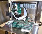 Unused- Domino A200 Small Character Ink Jet Coder, Model A200. Can print up to four lines of type with a variety of print formats including logos, bar codes, automatic serial numbering/batch coding. ...