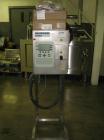 Used Markem Coder, Model 9096S. Print head on stainless steel stand with controls, 115/230 volt, serial #050531.