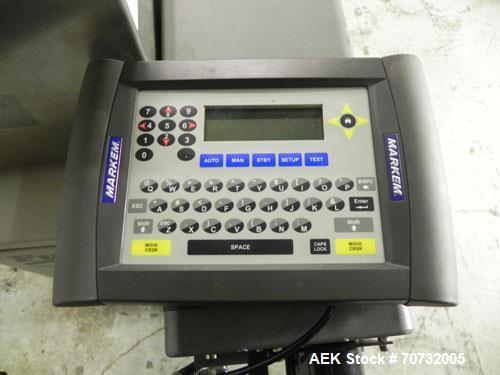 Used Markem Model SmartLase 110 Laser Printer. Capable of speeds up to 400 characters per second. Unit includes Fumex air purifier. Machine has a wave-length rating of 9.3M. Machine can code 1-4 line...