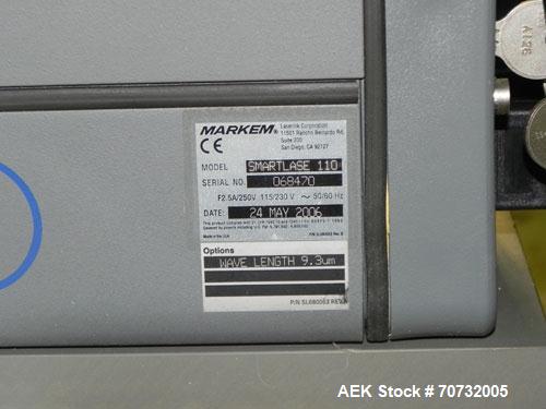Used Markem Model SmartLase 110 Laser Printer. Capable of speeds up to 400 characters per second. Unit includes Fumex air purifier. Machine has a wave-length rating of 9.3M. Machine can code 1-4 line...
