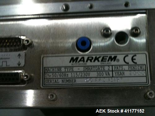 Markem High Speed Thermal Ribbon Continuous Left Hand Feed Motion Coder, Model SmartDate 2. Prints at speeds up to 39 inches per second (typically 400 packages per minute). The SmartDate coder codes ...
