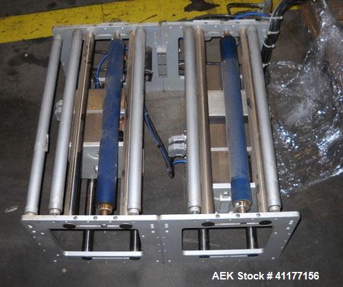 Used Markem High Speed Thermal Ribbon Continuous Left Hand Feed Motion Coder, Model SmartDate 2. Prints at speeds up to 39 inches per second (typically 400 packages per minute). The SmartDate coder c...
