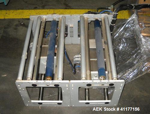 Used Markem High Speed Thermal Ribbon Continuous Left Hand Feed Motion Coder, Model SmartDate 2. Prints at speeds up to 39 inches per second (typically 400 packages per minute). The SmartDate coder c...