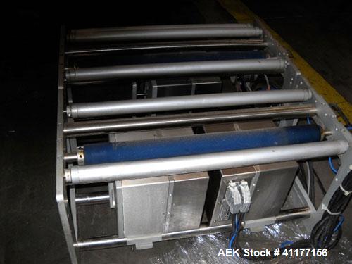 Used Markem High Speed Thermal Ribbon Continuous Left Hand Feed Motion Coder, Model SmartDate 2. Prints at speeds up to 39 inches per second (typically 400 packages per minute). The SmartDate coder c...