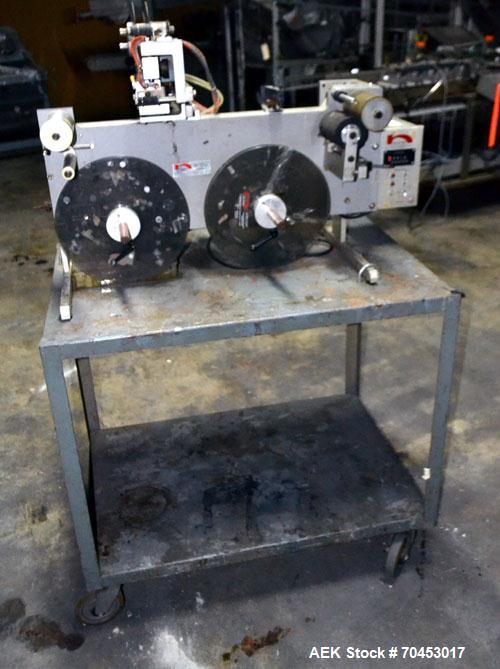 Used Norwood LIS offline stand alone label imprinting system. Capable of speeds up to 150 labels per minute. Imprint areas up to 4" x 4". Standard label reals on 3" inner coder and max 12" diam reel....