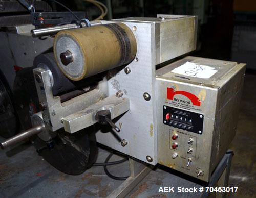 Used Norwood LIS offline stand alone label imprinting system. Capable of speeds up to 150 labels per minute. Imprint areas up to 4" x 4". Standard label reals on 3" inner coder and max 12" diam reel....