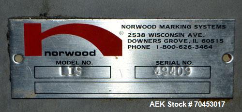 Used Norwood LIS offline stand alone label imprinting system. Capable of speeds up to 150 labels per minute. Imprint areas up to 4" x 4". Standard label reals on 3" inner coder and max 12" diam reel....
