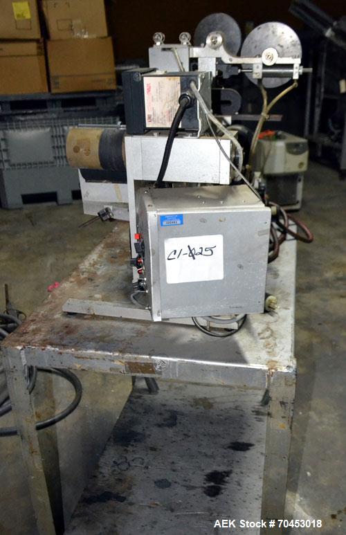 Used Norwood LIS offline stand alone label imprinting system. Capable of speeds up to 150 labels per minute. Imprint areas up to 4" x 4". Standard label reals on 3" inner coder and max 12" diam reel....