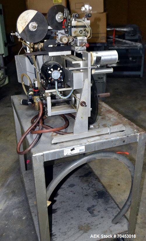 Used Norwood LIS offline stand alone label imprinting system. Capable of speeds up to 150 labels per minute. Imprint areas up to 4" x 4". Standard label reals on 3" inner coder and max 12" diam reel....