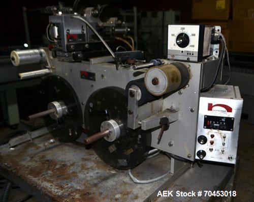 Used Norwood LIS offline stand alone label imprinting system. Capable of speeds up to 150 labels per minute. Imprint areas up to 4" x 4". Standard label reals on 3" inner coder and max 12" diam reel....
