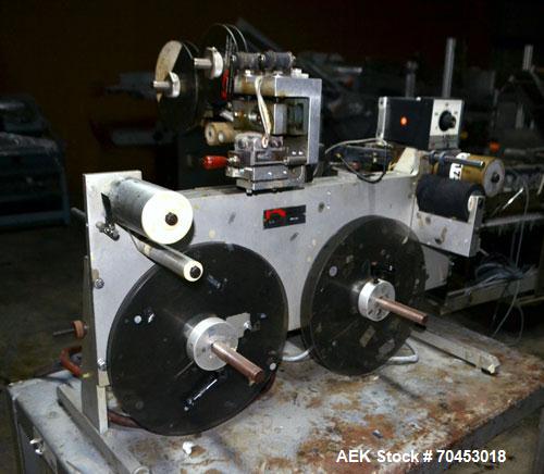 Used Norwood LIS offline stand alone label imprinting system. Capable of speeds up to 150 labels per minute. Imprint areas up to 4" x 4". Standard label reals on 3" inner coder and max 12" diam reel....