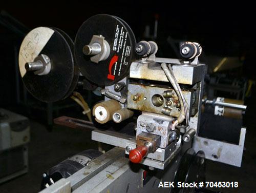 Used Norwood LIS offline stand alone label imprinting system. Capable of speeds up to 150 labels per minute. Imprint areas up to 4" x 4". Standard label reals on 3" inner coder and max 12" diam reel....