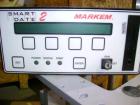 Used Markem High Speed Thermal Ribbon Continuous Left Hand Feed Motion Coder, Model SmartDate 2. Prints at speeds up to 39 inches per second (typically 400 packages per minute). The SmartDate coder c...
