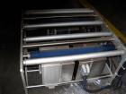 Used Markem High Speed Thermal Ribbon Continuous Left Hand Feed Motion Coder, Model SmartDate 2. Prints at speeds up to 39 inches per second (typically 400 packages per minute). The SmartDate coder c...