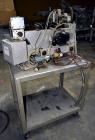Used Norwood LIS offline stand alone label imprinting system. Capable of speeds up to 150 labels per minute. Imprint areas up to 4