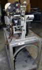 Used Norwood LIS offline stand alone label imprinting system. Capable of speeds up to 150 labels per minute. Imprint areas up to 4