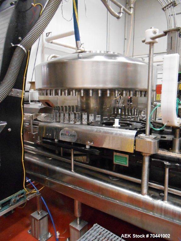 Used Hot Fill Beverage Line capable of up to 600 bottles per minute, comprised of the following equipment: Sentry model 5022 depalletizer; Alliance lowerator; Filler Specialties monobloc 54 head fill...