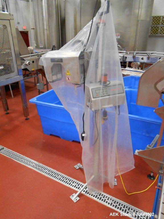 Used Hot Fill Beverage Line capable of up to 600 bottles per minute, comprised of the following equipment: Sentry model 5022 depalletizer; Alliance lowerator; Filler Specialties monobloc 54 head fill...