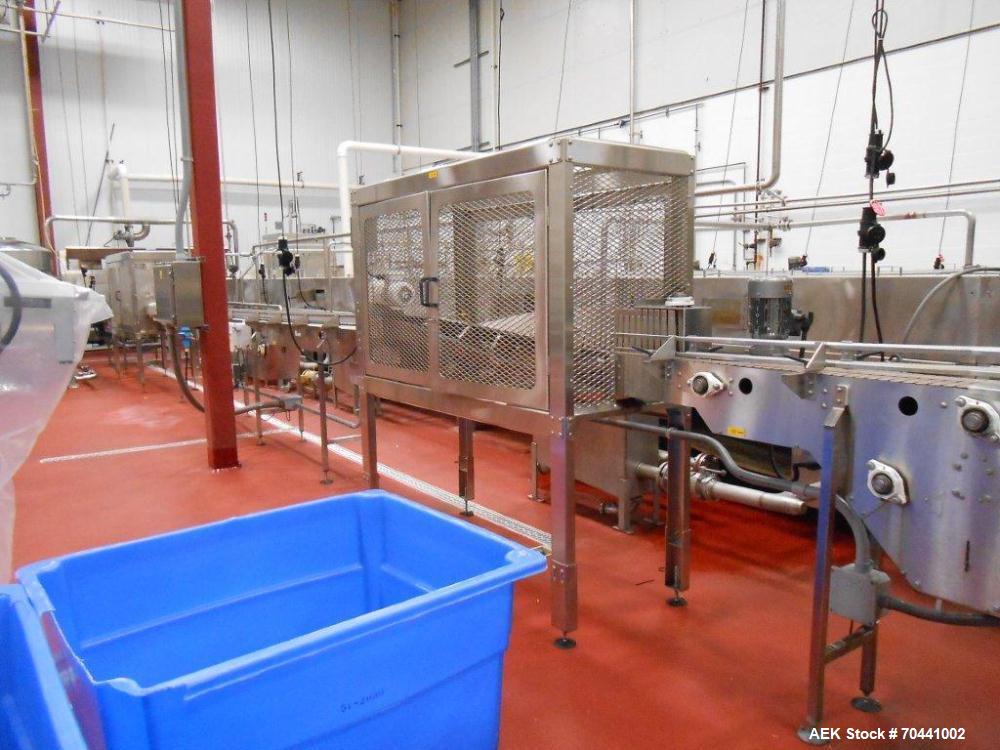 Used Hot Fill Beverage Line capable of up to 600 bottles per minute, comprised of the following equipment: Sentry model 5022 depalletizer; Alliance lowerator; Filler Specialties monobloc 54 head fill...
