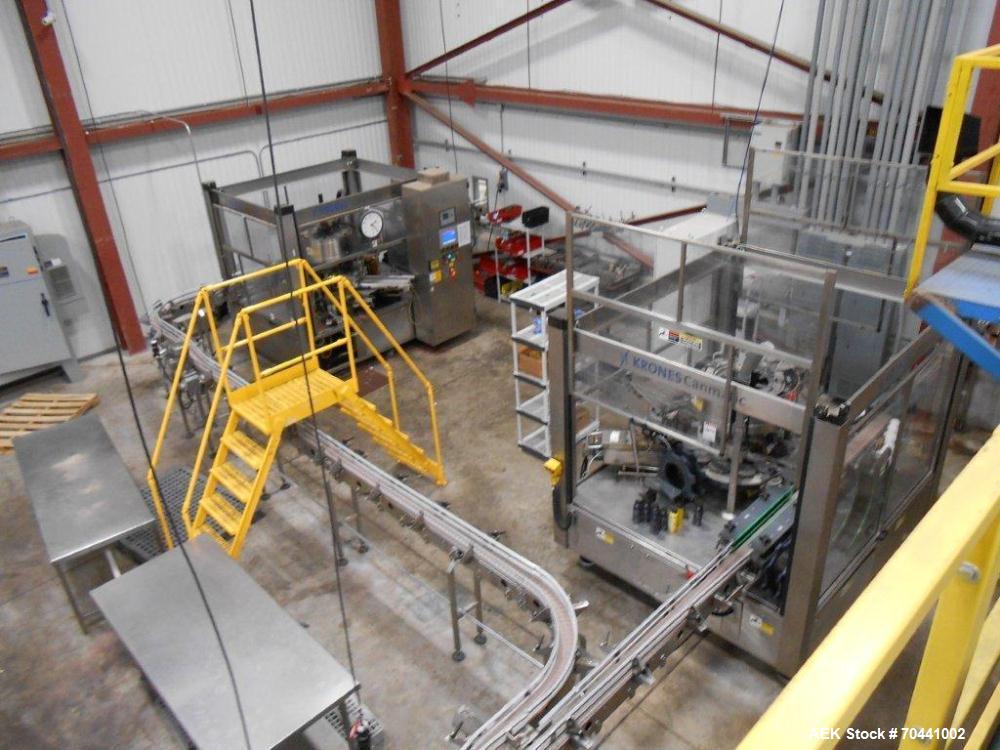 Used Hot Fill Beverage Line capable of up to 600 bottles per minute, comprised of the following equipment: Sentry model 5022 depalletizer; Alliance lowerator; Filler Specialties monobloc 54 head fill...
