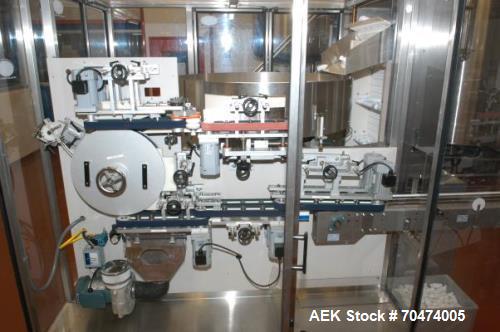 Used 2 oz. Energy Shot Bottle Filling Line. Includes: New England Model NEHCPCL bottle unscrambler with bottle elevator, capable of 250/minute. DTM Purefil 2000 12-head straightline continuous motion...