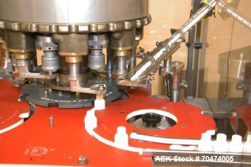 Used 2 oz. Energy Shot Bottle Filling Line. Includes: New England Model NEHCPCL bottle unscrambler with bottle elevator, capable of 250/minute. DTM Purefil 2000 12-head straightline continuous motion...