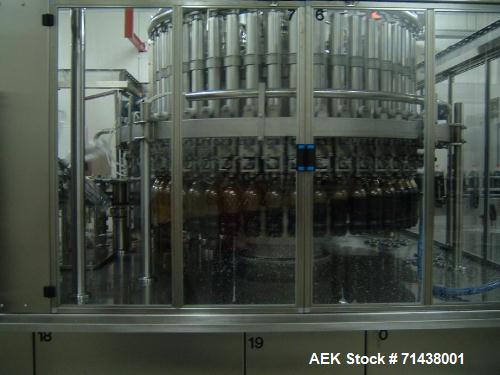 Línea de producción utiliza bebida completa. Consta de: Krones Contiform soplado máquina, modelo 112-10. Máquina para botell...