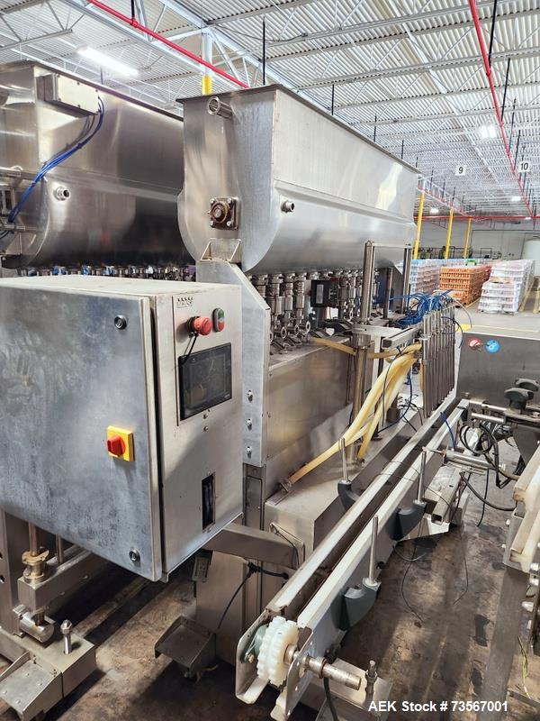 Used Acasi Model Tru-PI-12-V Automatic Inline Piston Filling Line Last Running Sauces. Consists of (2) Acasi Model Tru-12-VS Fillers, Resina Model NRC 40 inline quill capper, Acasi Trucap8-Vib capper...