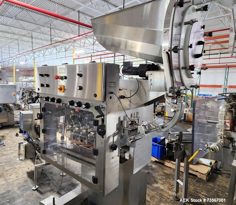 Used Acasi Model Tru-PI-12-V Automatic Inline Piston Filling Line Last Running Sauces. Consists of (2) Acasi Model Tru-12-VS Fillers, Resina Model NRC 40 inline quill capper, Acasi Trucap8-Vib capper...