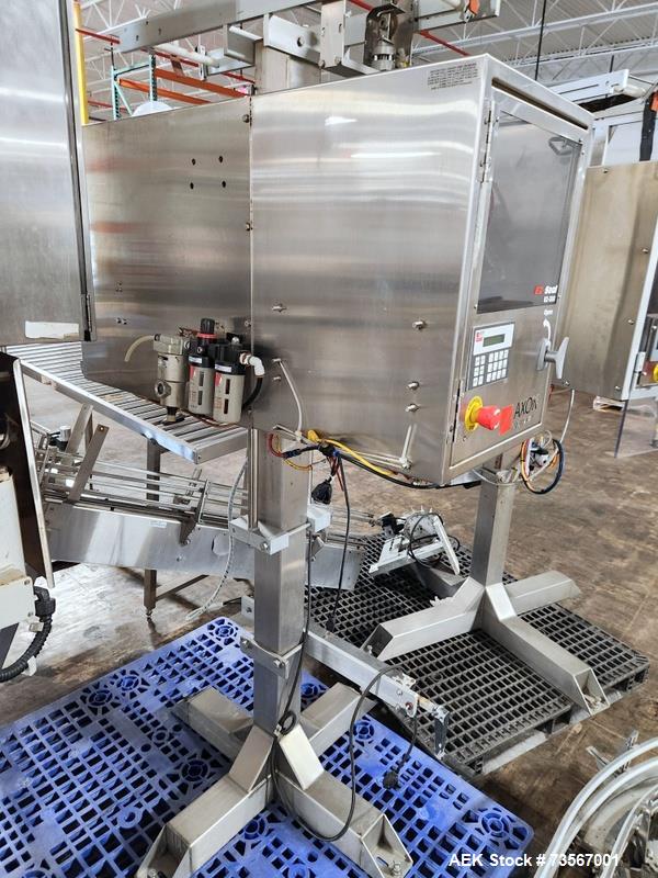 Used Acasi Model Tru-PI-12-V Automatic Inline Piston Filling Line Last Running Sauces. Consists of (2) Acasi Model Tru-12-VS Fillers, Resina Model NRC 40 inline quill capper, Acasi Trucap8-Vib capper...