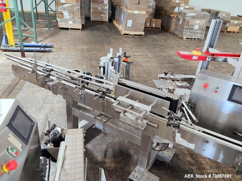 Used Acasi Model Tru-PI-12-V Automatic Inline Piston Filling Line Last Running Sauces. Consists of (2) Acasi Model Tru-12-VS Fillers, Resina Model NRC 40 inline quill capper, Acasi Trucap8-Vib capper...