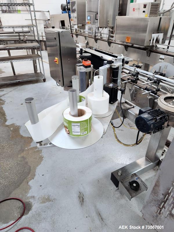 Used Acasi Model Tru-PI-12-V Automatic Inline Piston Filling Line Last Running Sauces. Consists of (2) Acasi Model Tru-12-VS Fillers, Resina Model NRC 40 inline quill capper, Acasi Trucap8-Vib capper...