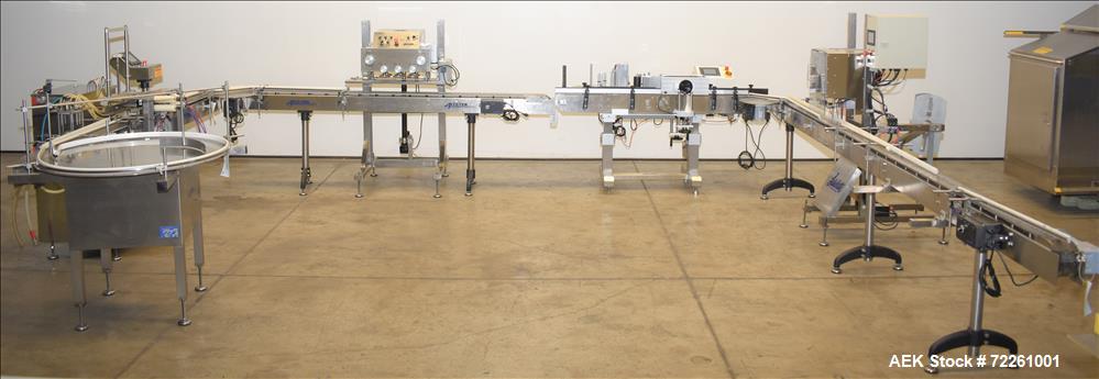 Used Accutek 6 Automatic Vacuum Liquid Filling Line for Glass Containers.