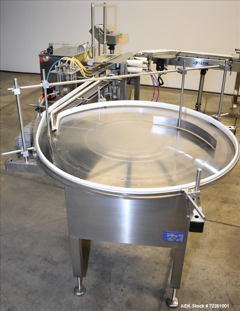 Used Accutek 6 Automatic Vacuum Liquid Filling Line for Glass Containers.